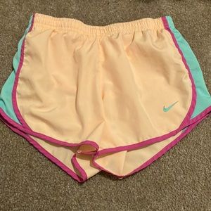 Colored Nike girls youth medium shorts w drawstrings and built in shorts